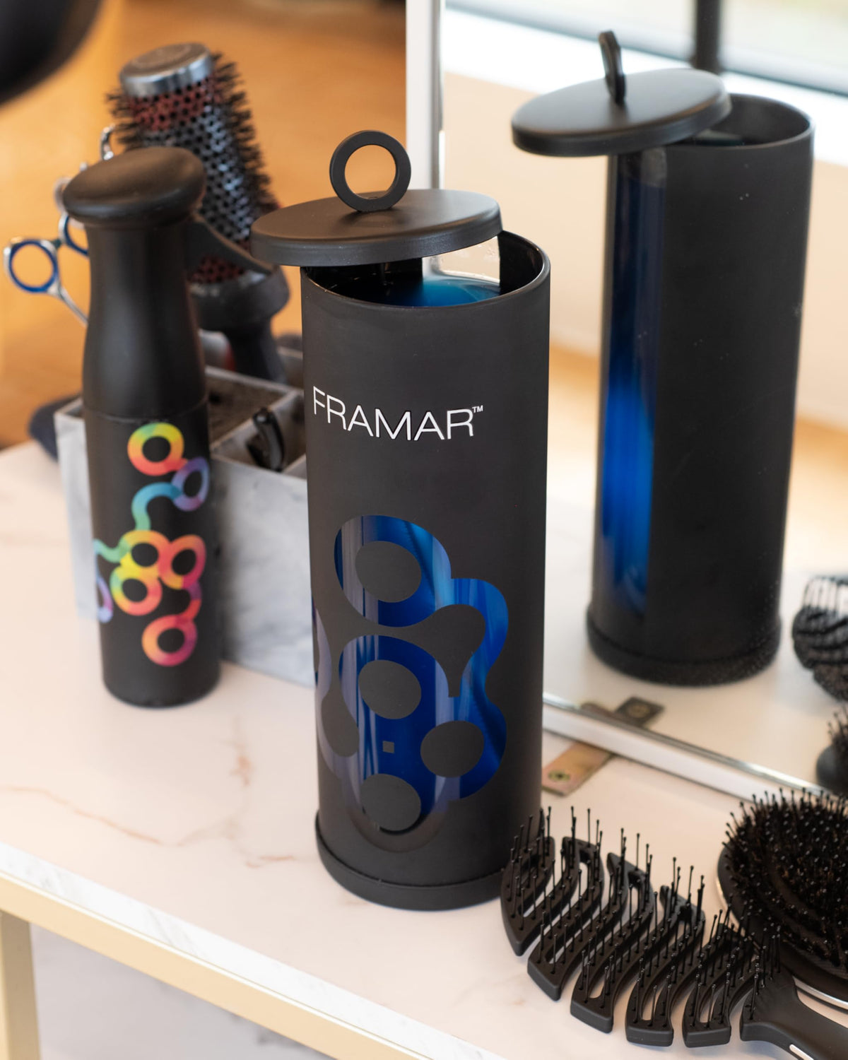 FRAMAR disinfectant jar with durable glass and plastic construction for daily use.