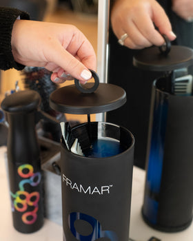 FRAMAR disinfectant jar with non-slip base for stable sanitizing sessions.