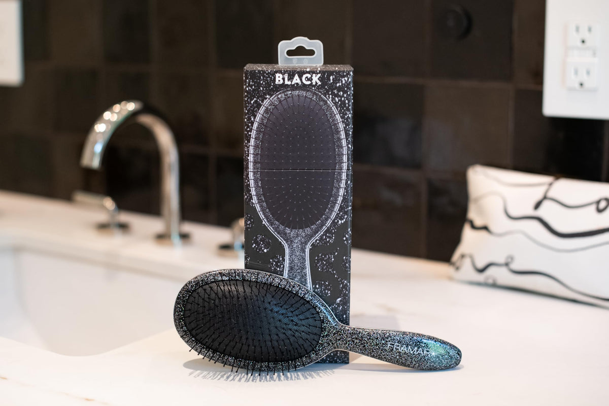 FRAMAR Glitter Hair Brush red glitter design adds glam to routine.
