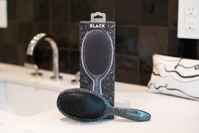 FRAMAR Glitter Hair Brush red glitter design adds glam to routine.