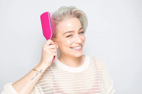 Framar paddle brush purse-ready design in pink