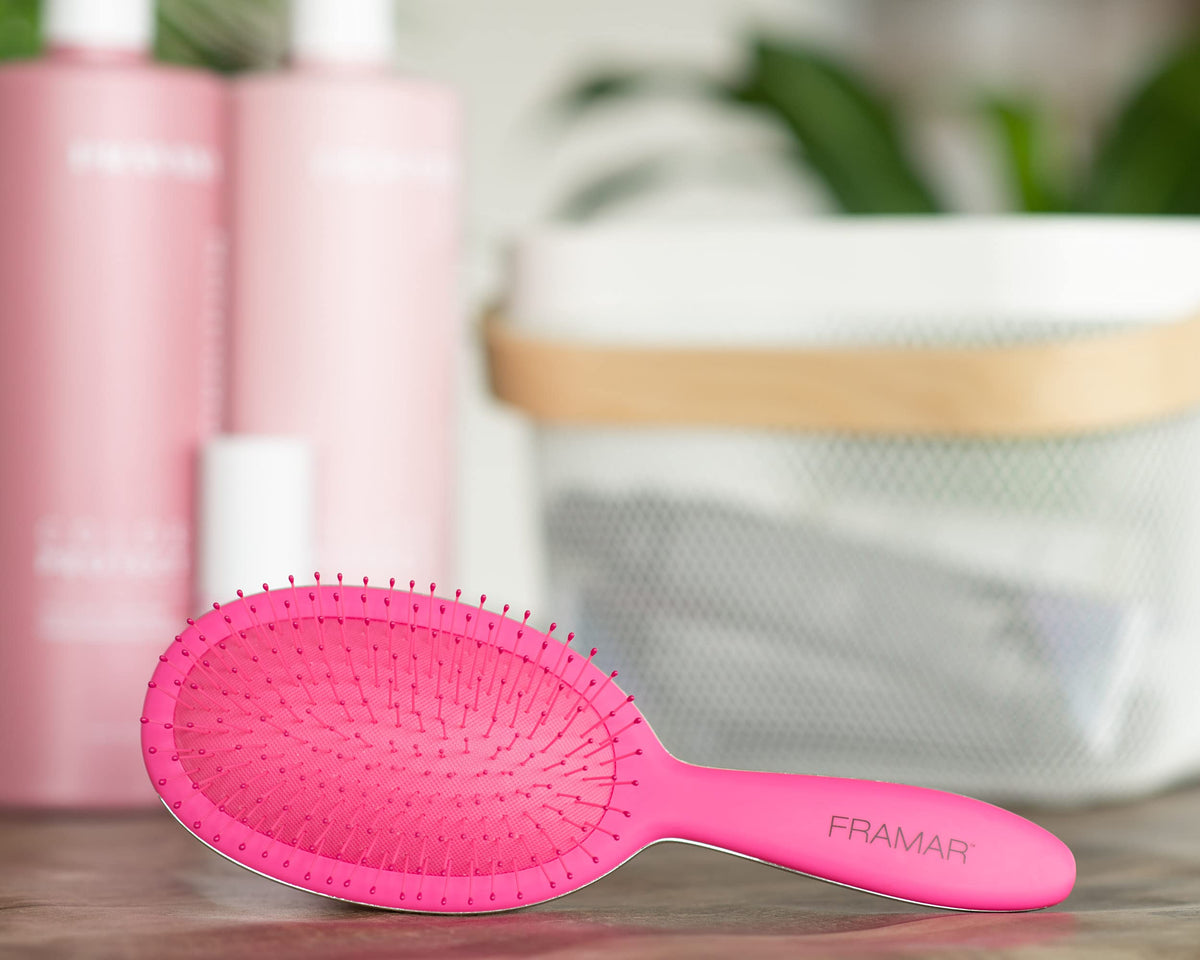FRAMAR scalp massage detangler promotes comfortable brushing and gentle scalp contact.