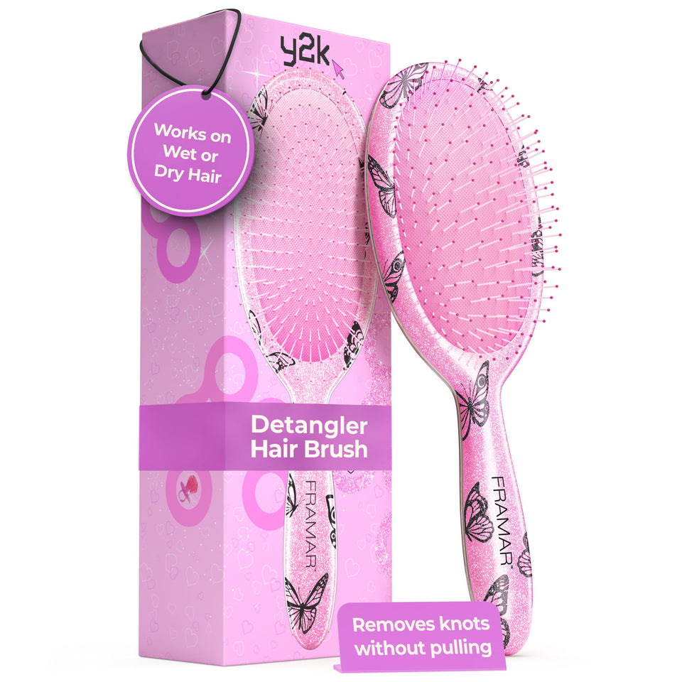 FRAMAR Y2K print detangler brush on wet hair for quick, painless detangling