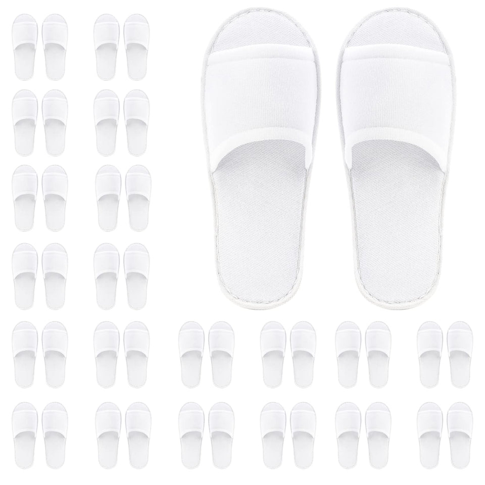 Frcctre disposable slippers with open-toe white design for comfortable hotel guests.