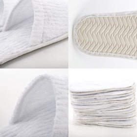 Frcctre white slippers on a bedside tray showing hotel room versatility.