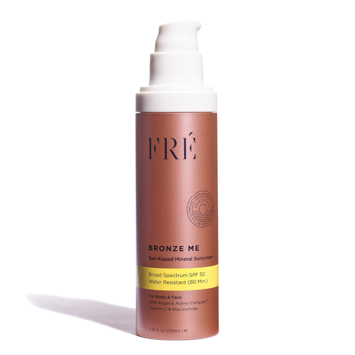FRÉ Bronze Me SPF 50 bottle cap showing tinted sunscreen and glow