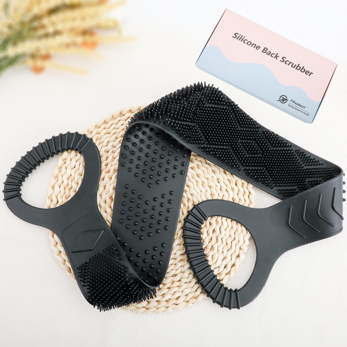 FREATECH silicone back scrubber close-up showing flexible design.
