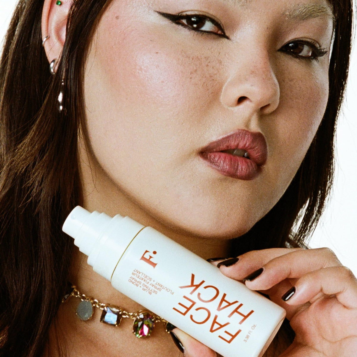 Freck FACE HACK skincare ingredients visual emphasizes basil and kelp complex.