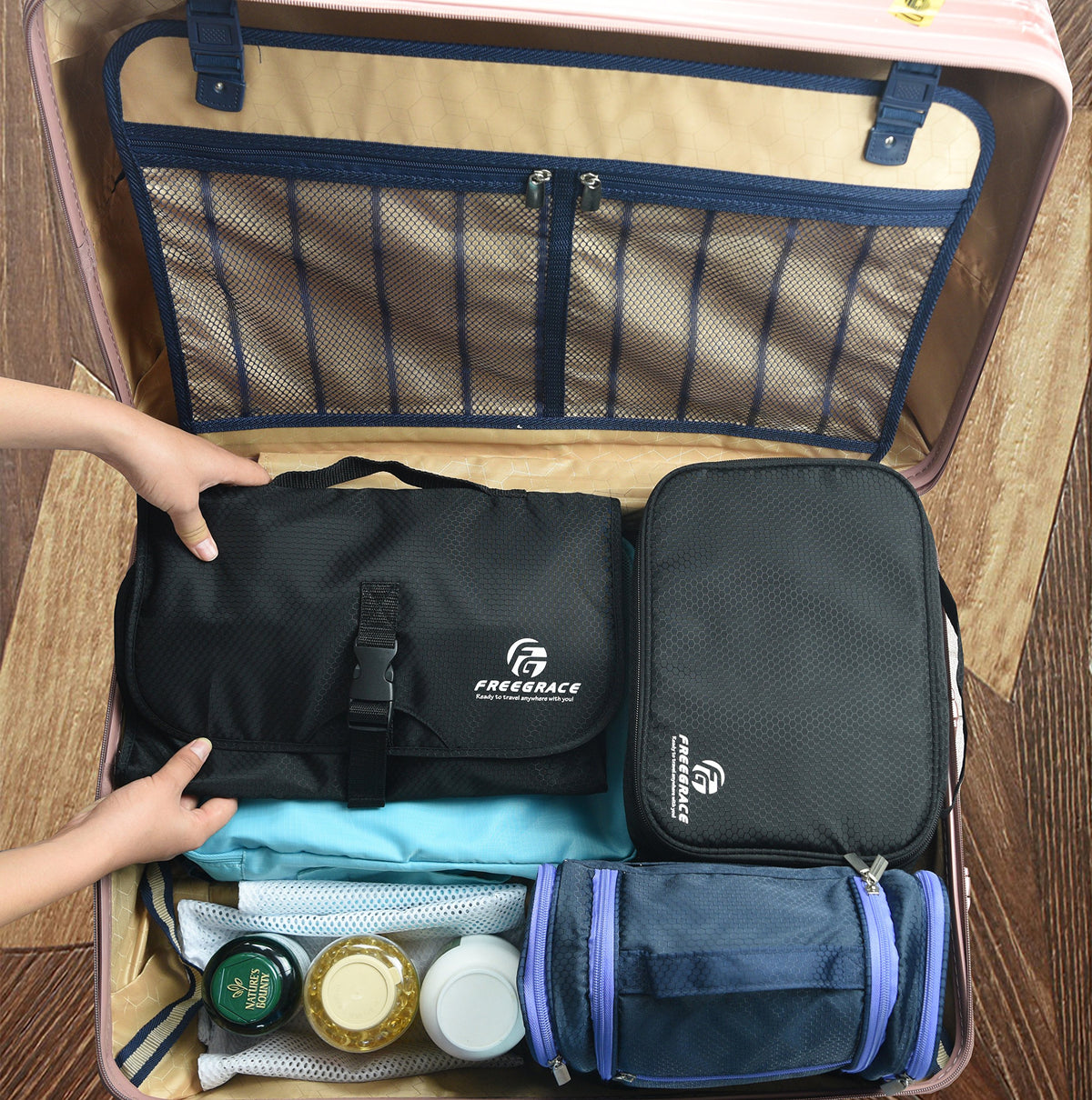 Freegrace black travel bag fits carry-on size and essentials