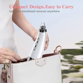 FREESHOW Blackhead Pore Vacuum in hands-on use with ergonomic grip.