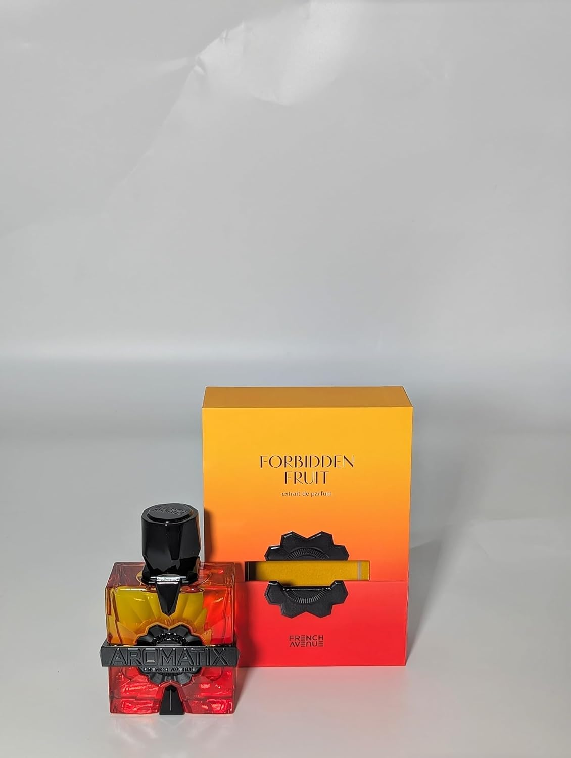 French Avenue Aromatix Forbidden Fruit gradient bottle, eye-catching centerpiece for vanity.