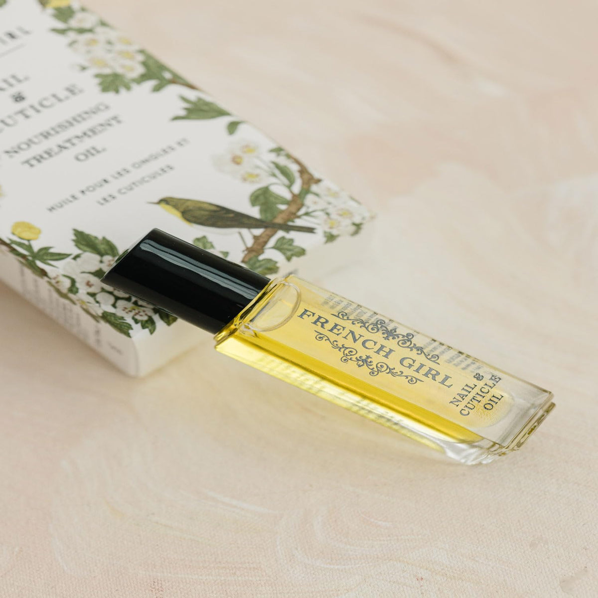 Applying French Girl Organics Nail & Cuticle Oil for daily moisture.