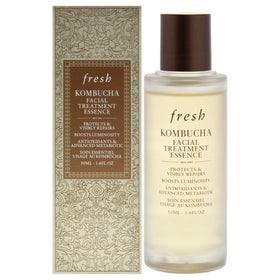 Fresh Kombucha Facial Treatment Essence bottle on marble counter for hydration