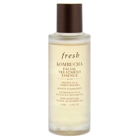 Close up of Fresh Kombucha Facial Treatment Essence dropper releasing hydration