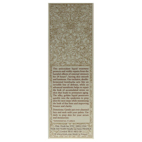 Soft lit bottle of Fresh Kombucha Essence for premium skincare
