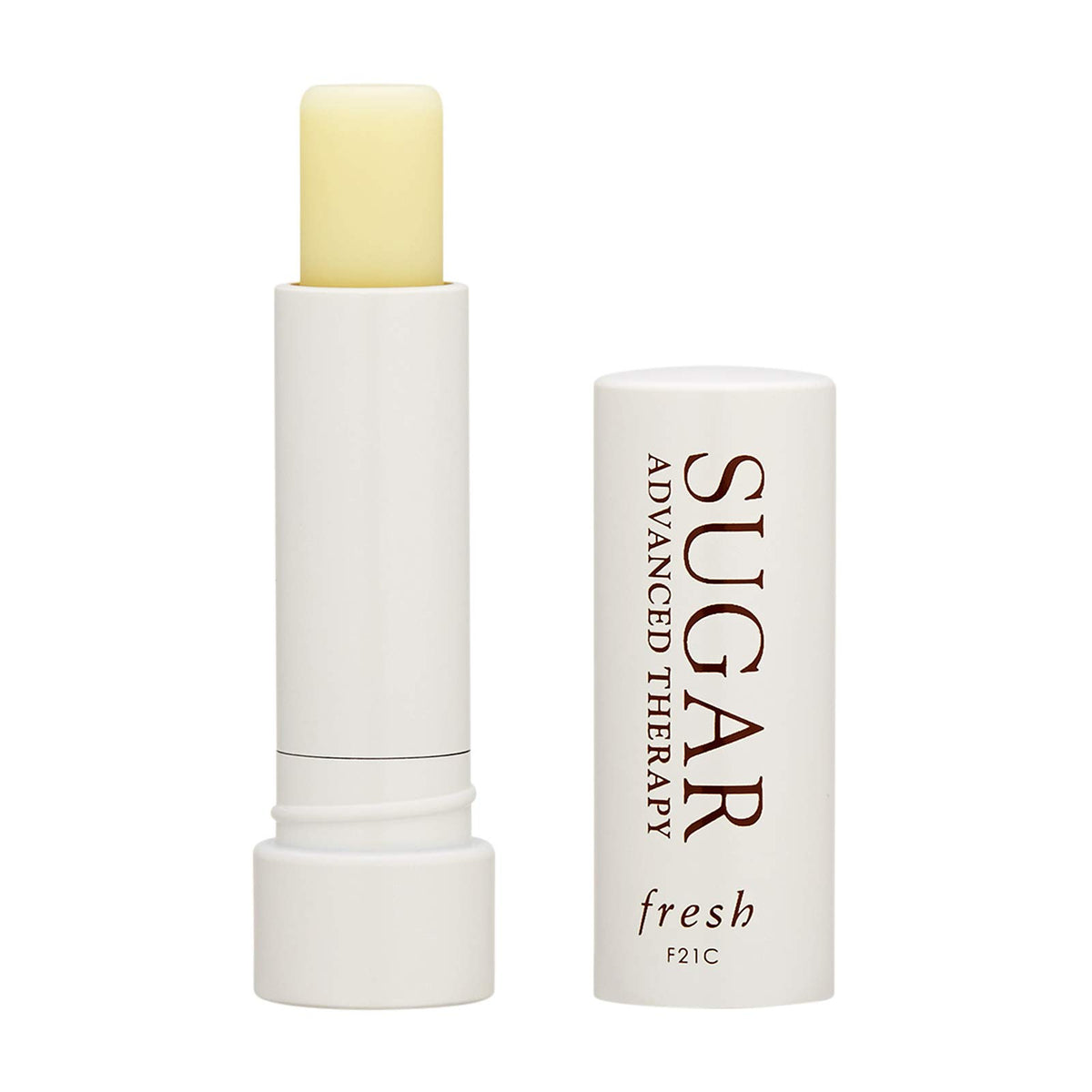 Close-up of Fresh Sugar Advanced Therapy Lip Treatment half-size compact showing glossy nourishment.