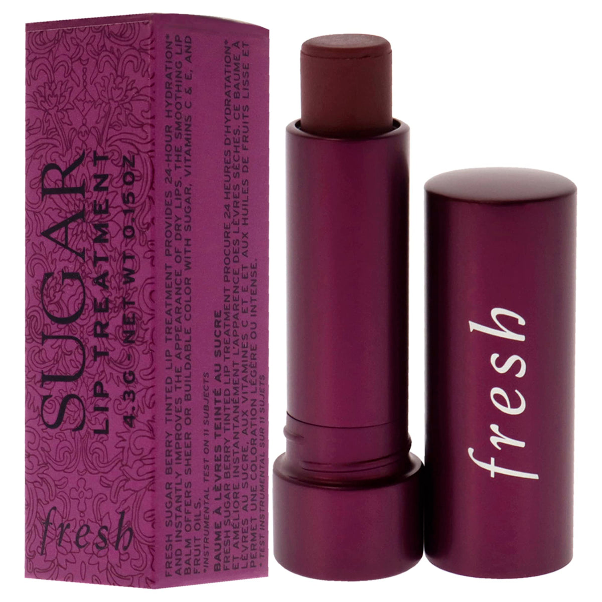 Fresh Sugar Lip Treatment Berry tube close-up shows nourishing lip care in use