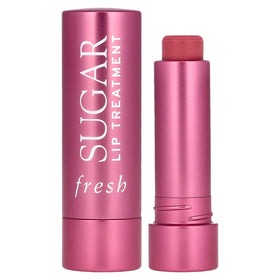 Fresh Sugar Lip Treatment Bloom compact shows tinted hydration for soft lips.