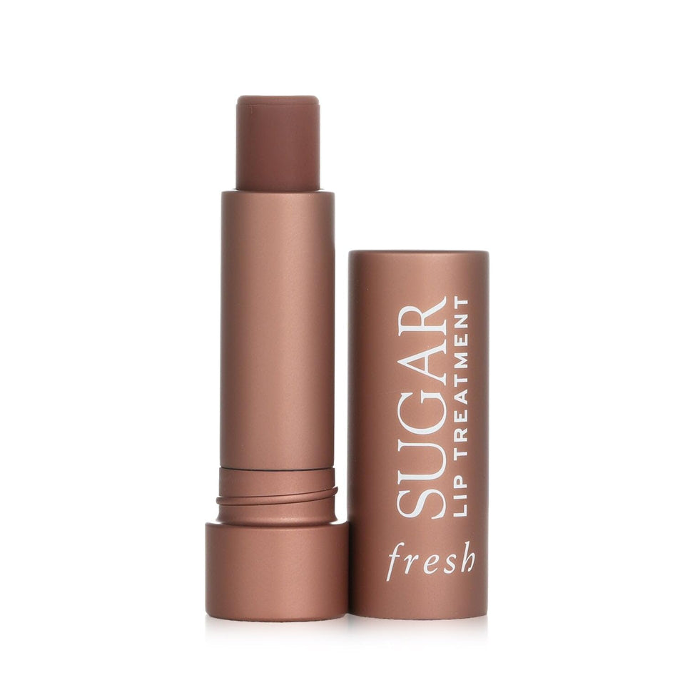 Fresh Sugar Lip Treatment Cocoa 0.15 oz bottle showing hydrating sheer color for lips.
