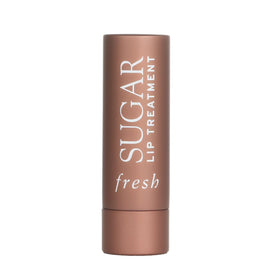 Fresh Sugar Lip Treatment Cocoa on shelf demonstrates buildable tint and conditioning benefits.