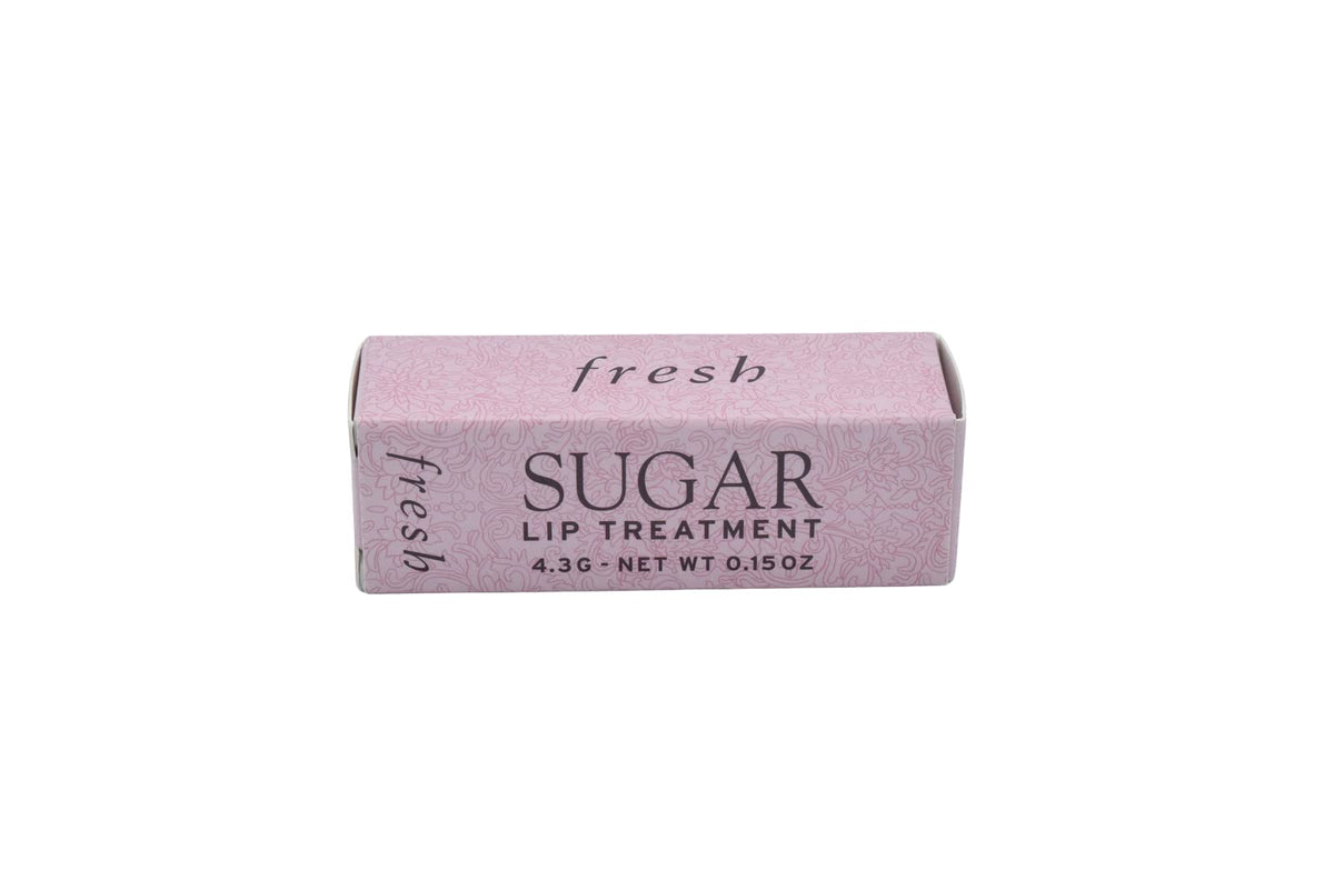 Fresh Sugar Lip Treatment Petal applied for subtle gloss.