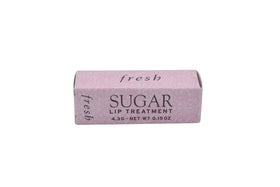 Fresh Sugar Lip Treatment Petal applied for subtle gloss.