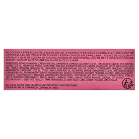 Fresh Sugar Lip Treatment Plum color swatch on lips for a soft, buildable tint.