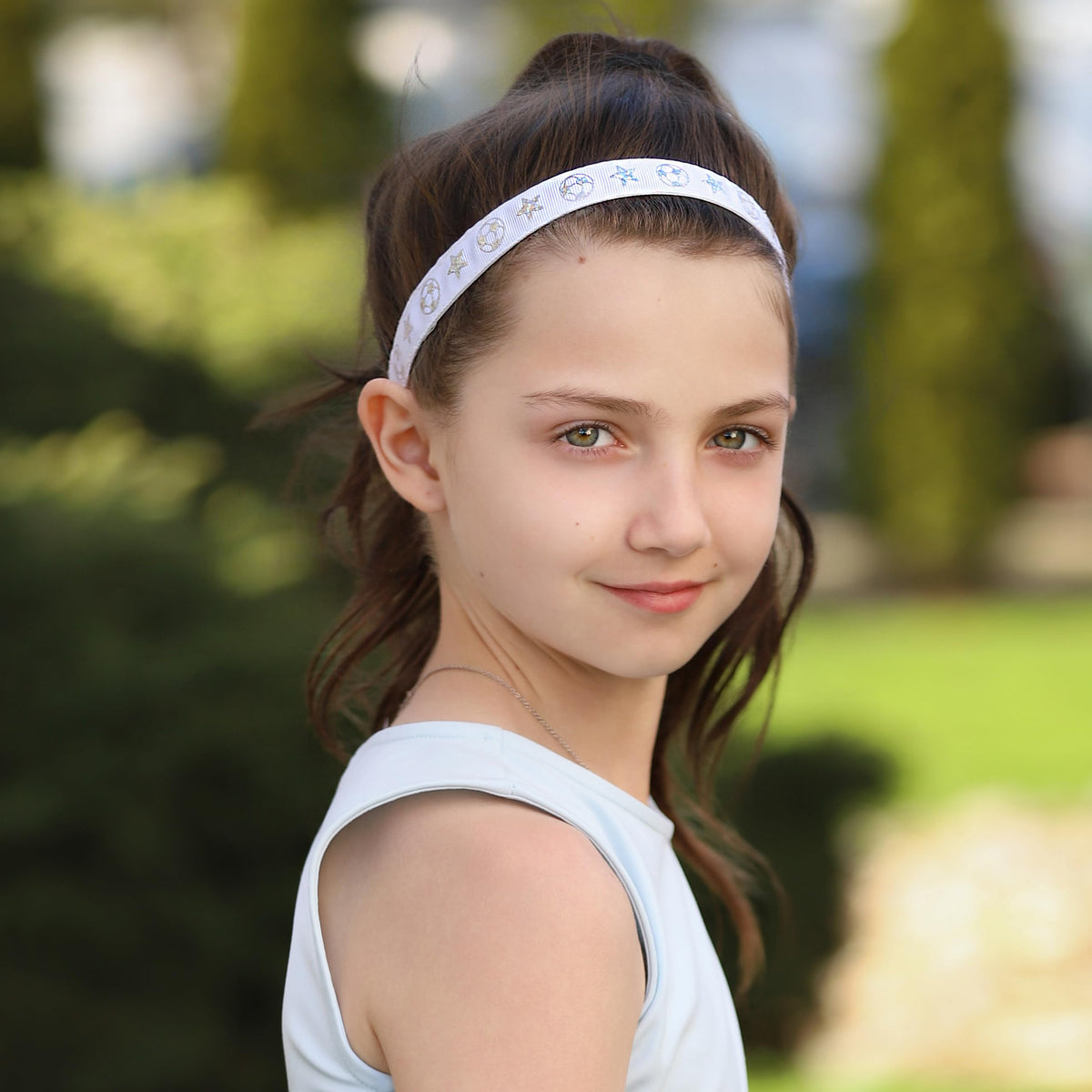 FROG SAC soccer headbands help keep hair away from the face during play