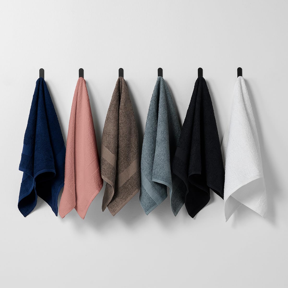 Fromm color-safe towels provide plush drying for long curly hair.