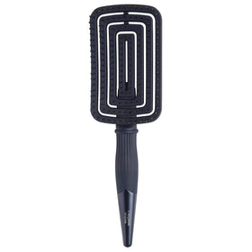 Fromm Intuition Flexer detangler brush gliding through wet hair for gentle detangling
