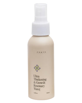 FRØYA Ultra Thickening Rosemary Water Spray refreshing damp hair for scalp hydration.