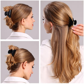 Fsmiling burgundy claw clip in use adds quick, versatile style.