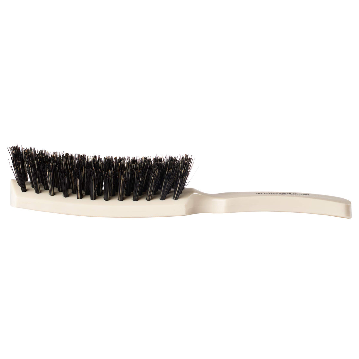 Fuller Brush Lustre Professional Hairbrush lifts hair to add body and volume.