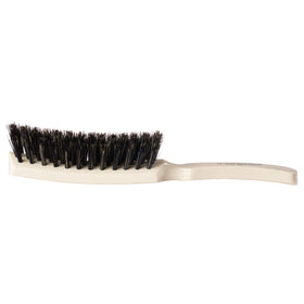 Fuller Brush Lustre Professional Hairbrush lifts hair to add body and volume.