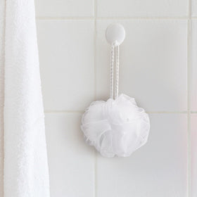 Funnymoom white loofah made of PE material offers soft, durable cleansing.