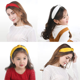 Funtopia pearl headband closeup shows classic shine and comfortable fit