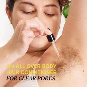 Fur Oil ingrown eliminator mitt beside the bottle for smoother skin.
