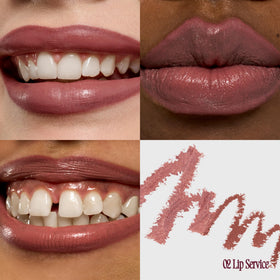 fwee lip service lip swatches on lips with rich pink color.