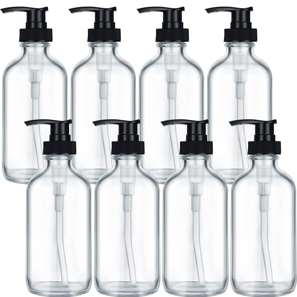 Gandeer eight-pack glass pump bottles in clear glass with black pumps, UV protection for contents