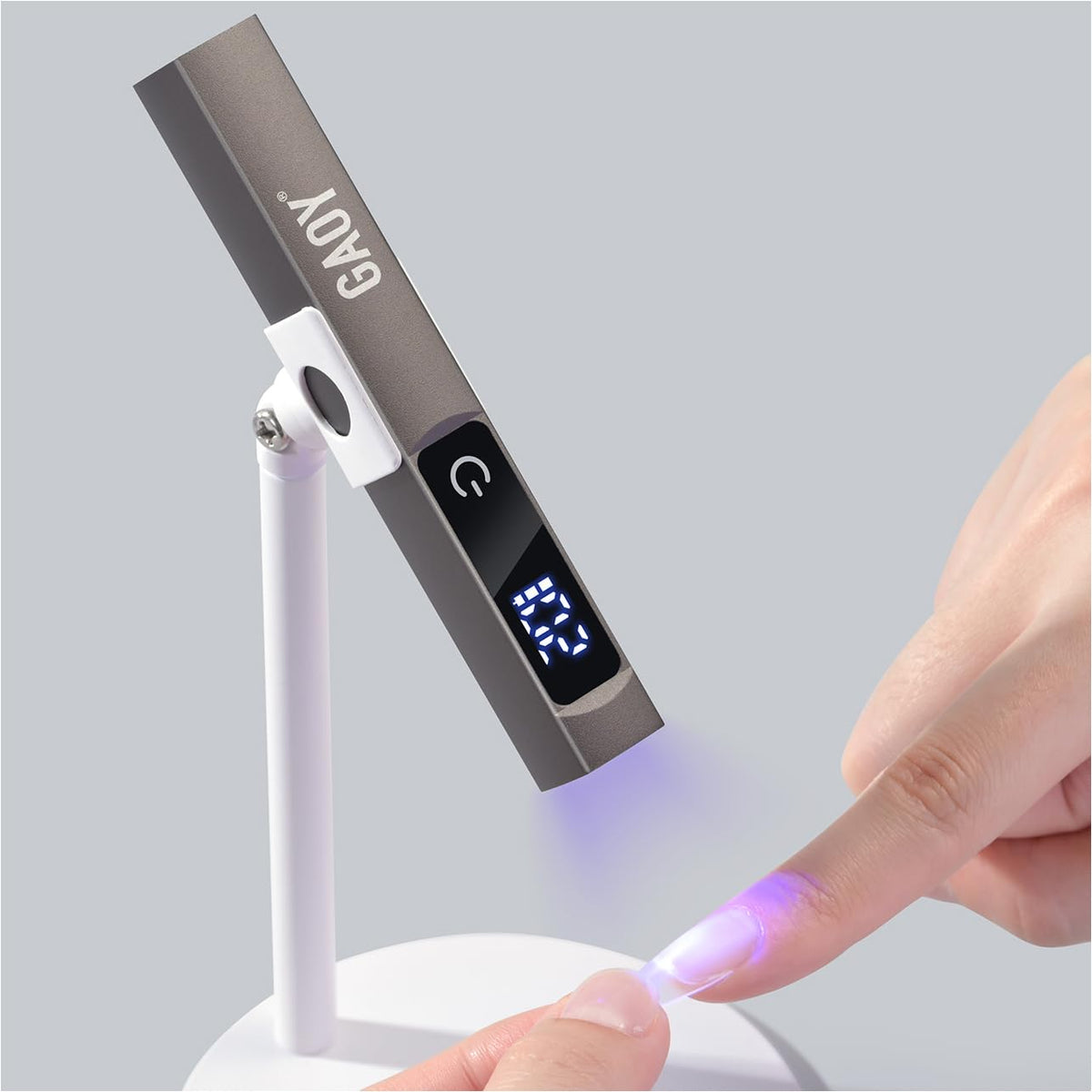 GAOY cordless nail lamp with stand for flexible curing at home or on the go.