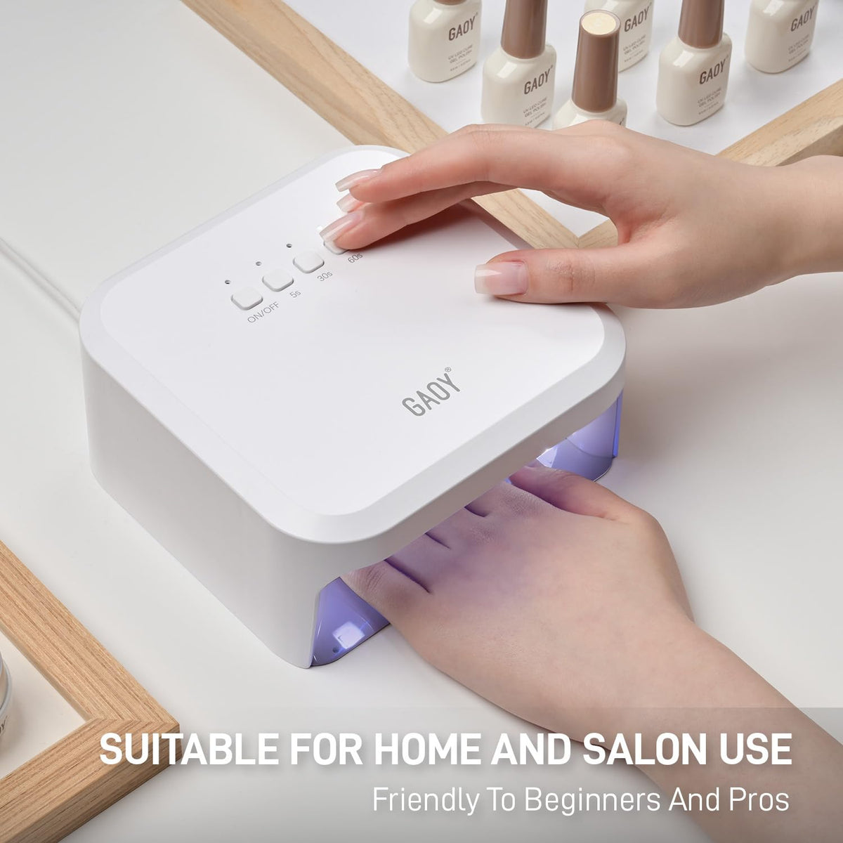 GAOY UV nail lamp in operation with hands inside for curing.