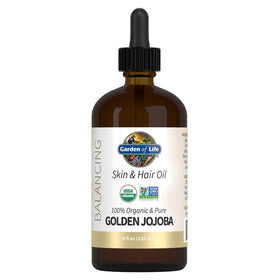 Garden of Life Jojoba Oil bottle showing pure organic golden oil for skin and hair hydration.