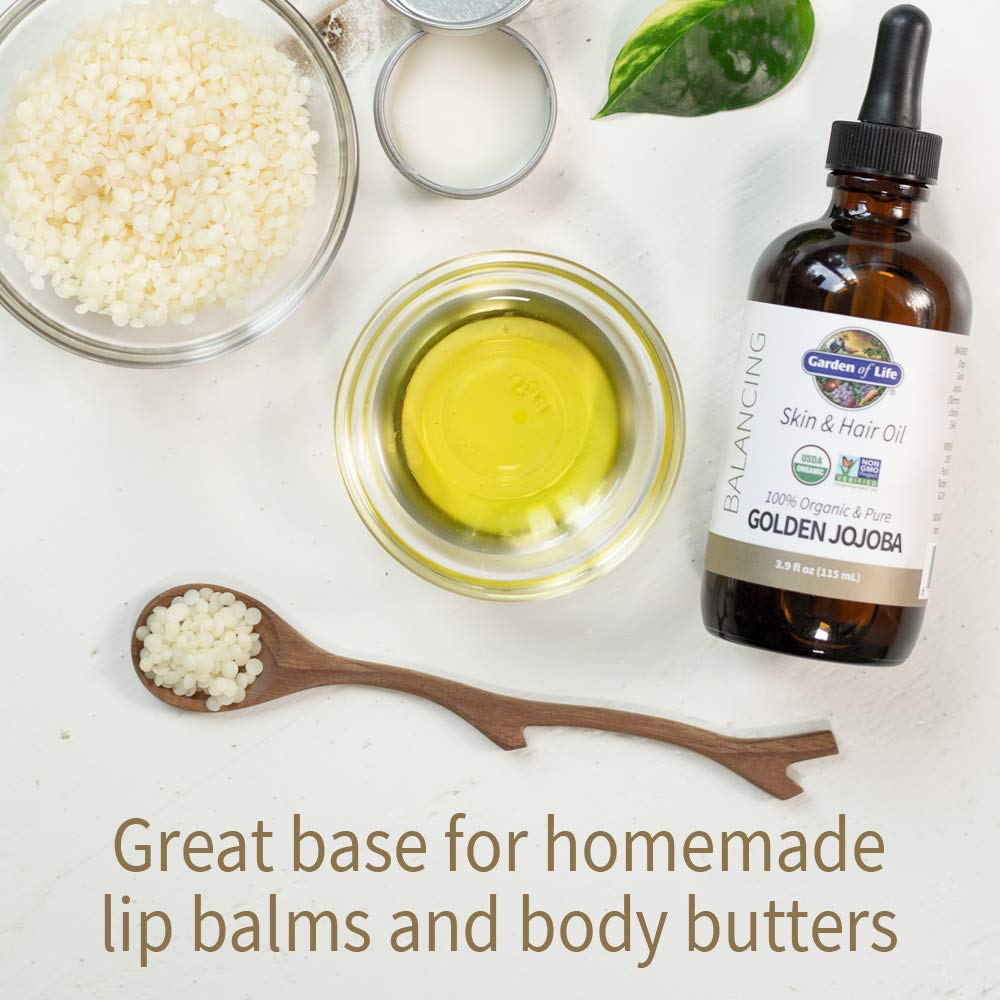 Garden of Life Jojoba Oil on skin showing quick absorption and silken finish.