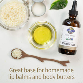 Garden of Life Jojoba Oil on skin showing quick absorption and silken finish.