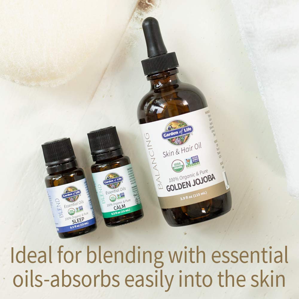 Garden of Life Jojoba Oil pour bottle demonstrating smooth, non-greasy texture in use.
