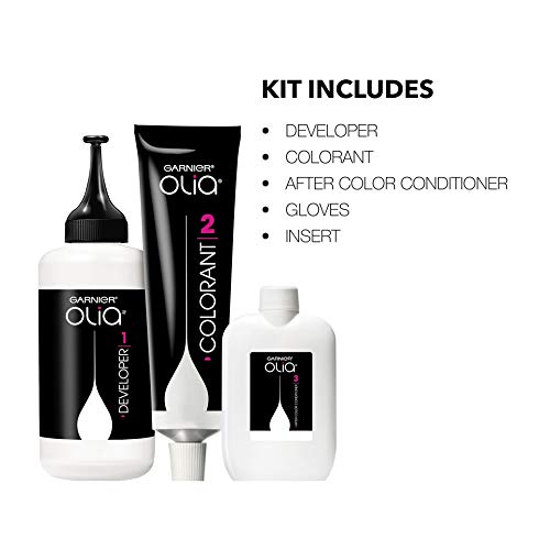Garnier Olia color developer bottle beside the colorant tube for even coverage.