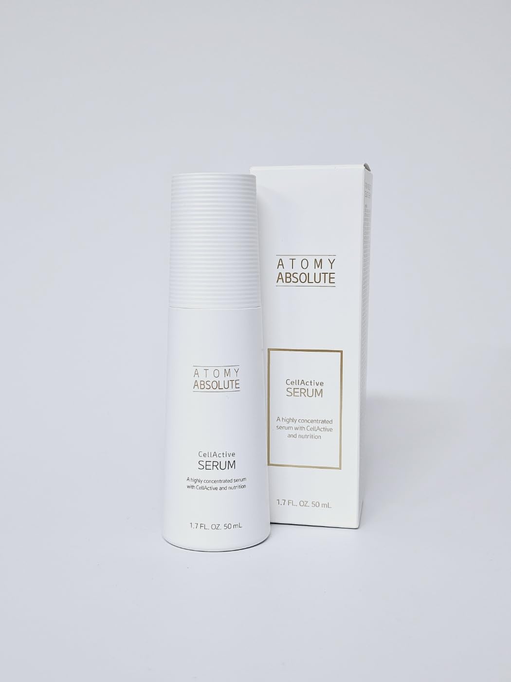Luxurious packaging of GASHINA STORY serum displayed on a vanity.
