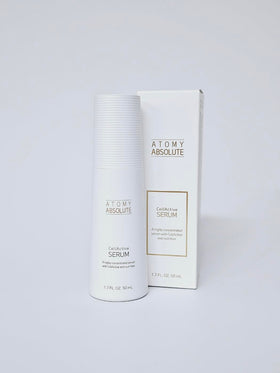 Luxurious packaging of GASHINA STORY serum displayed on a vanity.