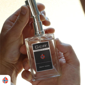Geir Ness EDP spray action showing a light mist for subtle scent.
