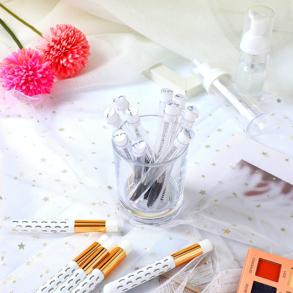 Geiserailie cleaning brushes and bottles arranged for versatile facial care kit.